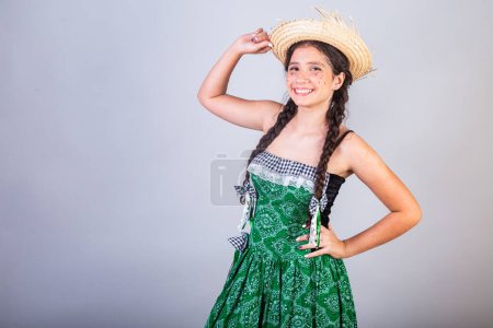 Photo for Brazilian girl, with clothes from Festa Junina, Arraial, Festa de So Joo. Horizontal portrait. - Royalty Free Image