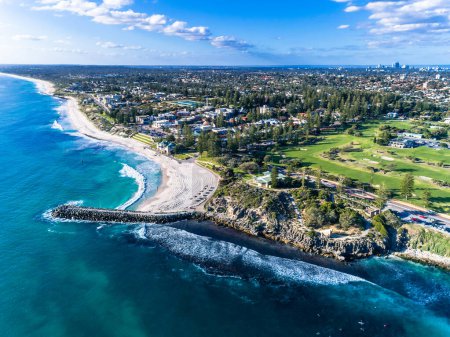 Photo for Aerial top down view of beach and clear blue water. Ocean waves on the beach as a background. Beautiful natural summer vacation holidays background. Cottesloe, Western Australia. Coastal seascapes - Royalty Free Image