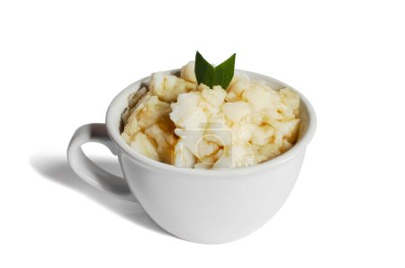 Photo for Bubur sumsum dessert porridge originating from Java. Bubur sumsum isolated on white background - Royalty Free Image