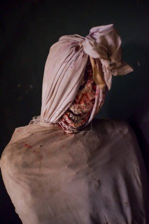 Photo for Close-up appearance of Pocong, a typical Indonesian ghost covered in a shroud - Royalty Free Image