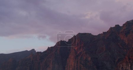 Photo for Los Gigantes during Sunset - Tenerife, Canary Islands, Spain. Volcanic beach in the Canary Islands. - Royalty Free Image