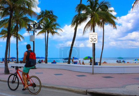 Photo for Fort Lauderdale, Florida, US - May 08, 2022: Fort Lauderdale beach near Las Olas Boulevard with the road in the foreground. - Royalty Free Image