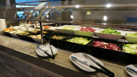 Photo for Barcelona, Spain - May 25, 2023: The food at dining room buffet on board cruise ship or flagship of MSC Grandiosa, the largest cruise ship built in Italy. - Royalty Free Image