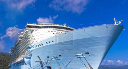 Photo for The abstract view of a large cruise ship docked near Labadee, Haiti and blue sky - Royalty Free Image