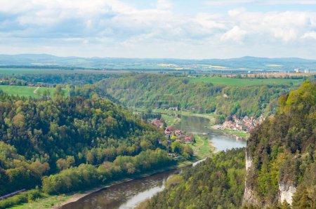 Beautiful summer view of Elbe river from Bastei view pont. Colorful morning scene of Saxon Switzerland national park, Germany, Europe. Splendid landscape of Sandstone Mountains, Saxony.