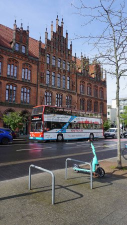 Photo for Hannover, Germany - March 28, 2015: Sightseeing city tour bus standing at street at Hannover, Germany - Royalty Free Image