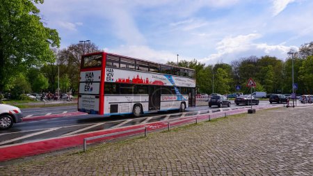 Photo for Hannover, Germany - April 17, 2024: Sightseeing city tour bus standing at street at Hannover, Germany - Royalty Free Image