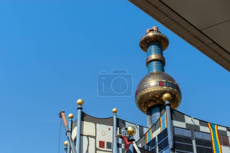 Photo for Vienna, austria 11 Sep 2023: The spittelau waste incineration factory hundertwassers iconic creation in vienna, blending art, sustainability, and functionality. - Royalty Free Image