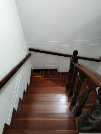 WOOD STAIRS WITH RAILINGS
