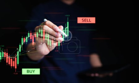 Geschäftsmann oder Händler zeigt auf wachsende virtuelle Hologramm-Kerzenständer. Planung Analyse Indikator und Strategie kaufen und verkaufen, Aktienmarkt, Geschäftswachstum, Investor Trading Stock Concept,