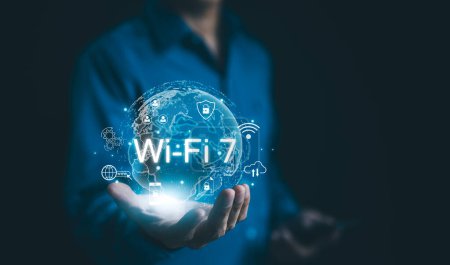 Global Wi-Fi Connectivity and Internet Technology Concept. A person holding a holographic globe highlighting Wi-Fi 7 connectivity, representing the global reach of modern internet technology. wifi7,