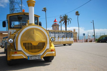 Photo for Touristic yellow bus in Pointa Da Piedad, Portugal - Royalty Free Image