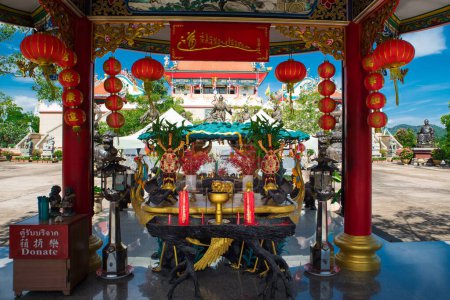 Photo for CHONBURI PROVINCE, THAILAND - JUNE 18, 2022. Anek Kusala Sala (Viharn Sien) Chinese Temple and Museum. Sacrificial altar decorated with Denglong (traditional Chinese lanterns) and Marigold flowers. - Royalty Free Image