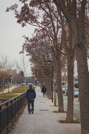 Photo for Man walking along a cycle path - Royalty Free Image