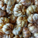 A Pile Of Whole Garlic Is Placed On The Table