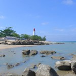 Beautiful Natural Scenery, The Coastline Of Tanjung Anda With Rocks At Low Tide