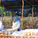 MUNTOK,INDONESIA - SEPTEMBER 10, 2023 : Muslim Women Keeping Food On The Table, In Rambat Village, Indonesia