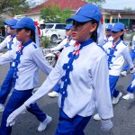 MUNTOK,INDONESIA - SEPTEMBER 10, 2023 : Marching March At High School Level In White And Blue Costumes, At The Celebration Of The Anniversary Of Indonesian Independence