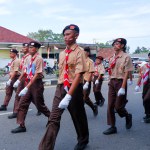 MUNTOK,INDONESIA - SEPTEMBER 10, 2023 : Marching march participants, high school students in scout uniforms, at the celebration of Indonesian independence day