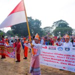 MUNTOK,INDONESIA - SEPTEMBER 10, 2023 : Carnival Participants For Elementary School Children In Various Traditional Costumes