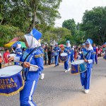 MUNTOK,INDONESIA - SEPTEMBER 10, 2023 : Middle School Student Marching Band Carnival Participants Dressed All In Blue, At The Celebration Of The Anniversary Of Indonesian Independence