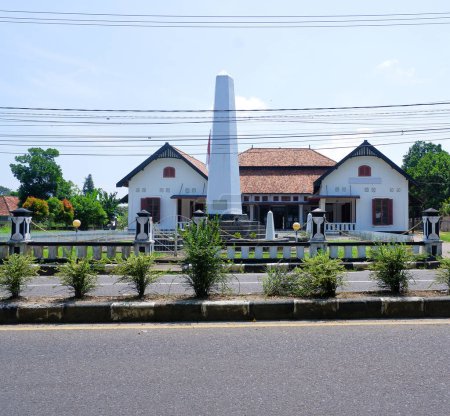 Indonesian Heroes' Guest House Building With A Monument In The City Of Muntok, West Bangka