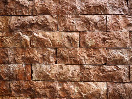 Foto de Textura de piedra roja en ladrillo de muro en Las Palmas de Gran Canaria. Espana 2023 - Imagen libre de derechos