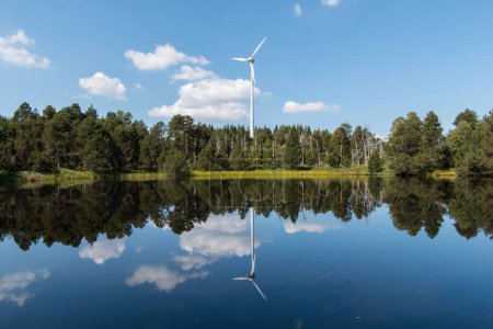 Photo for Windenergie trifft Naturschutzgebiet in toller Landschaft und einem See - Royalty Free Image