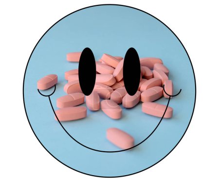 Schwarzes Lächeln, gefüllt mit rosa Pillen (Kapseln) auf blauem Hintergrund