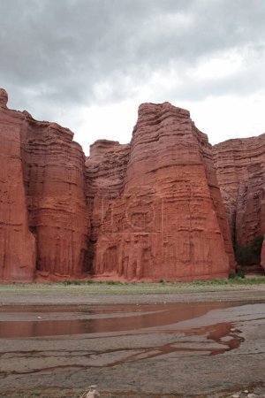 Photo for The lake and canyon red cliffs and arches. Panorama view of the red sandstone and rocky formation with beautiful texture. - Royalty Free Image