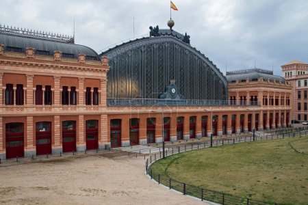 Photo for Empty city. Empty Atocha railway station building facade in Madrid, Spain. - Royalty Free Image