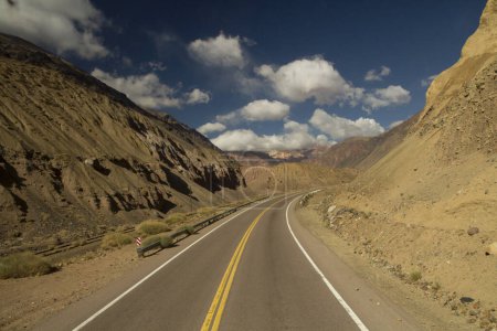 Traveling along the asphalt highway in the mountains on the road to mount Aconcagua.