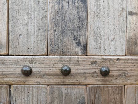 Photo for Detail of the nails and planks that make up a wooden door. - Royalty Free Image