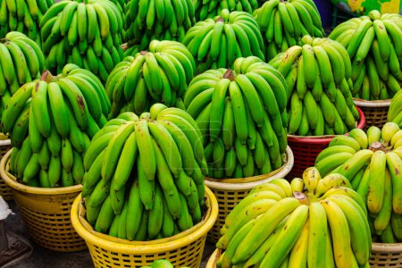 Big bunch of bananas on sale in the market in thailand
