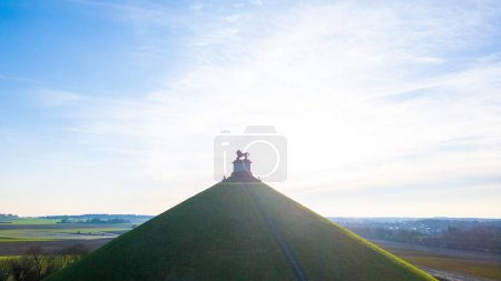 Photo for Waterloo, Brussels, Belgium, February 25th, 2024, This image portrays the Lions Mound at the historic site of the Waterloo Battlefield under the expansive morning sky. The silhouette of the lion - Royalty Free Image