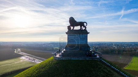 Photo for Waterloo, Brussels, Belgium, February 25th, 2024, The photograph showcases the Lions Mound with its imposing lion statue at the historic site of the Waterloo Battlefield. The early morning or late - Royalty Free Image