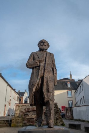 Photo for Trier, Rijnland-Palts, Germany, 23th of March, 2024, This image features the stern statue of Karl Marx in Trier, Germany. His historical importance is mirrored in the solid craftsmanship of the statue - Royalty Free Image