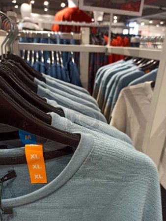 Photo for Blue sweatshirt collection at shopping mall - Royalty Free Image