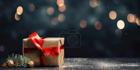 Photo for Wrapped Christmas gifts on dark rustic wooden table with fir tree branches and ball decoration, Abstract Defocused Lights - Royalty Free Image