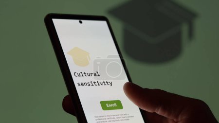 28th August 2023. A student holds a phone, enrolls in courses to study cultural sensitivity program, learn new skill and pass certification. Text in English, English text.