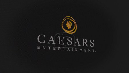 Photo for 07th September 2023 Reno, Nevada. The logo of Caesars Entertainment on a white wall of screens. Caesars Entertainment brand on a device. - Royalty Free Image