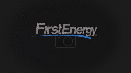 Foto de 07 Septiembre 2023 Akron, Ohio. El logotipo de FirstEnergy en una pared blanca de pantallas. Marca FirstEnergy en un dispositivo. - Imagen libre de derechos