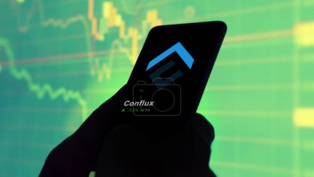 Photo for September 19th 2023. An investor analyzing the price of Conflux, the crypto $CFX broke out above the limit, CFX and climbs above the price. - Royalty Free Image