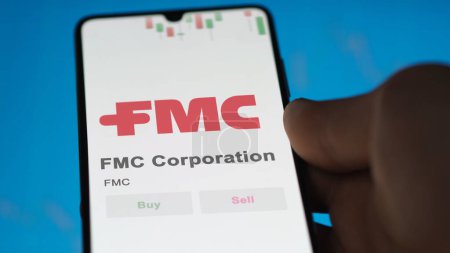 Photo for The logo of FMC Corporation on the screen of an exchange. FMC Corporation price stocks, $FMC on a device. - Royalty Free Image
