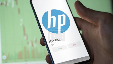 Photo for The logo of HP Inc. on the screen of an exchange. HP Inc  price stocks, $HPQ on a device. - Royalty Free Image
