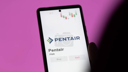 Photo for The logo of Pentair on the screen of an exchange. Pentair price stocks, $PNR on a device. - Royalty Free Image