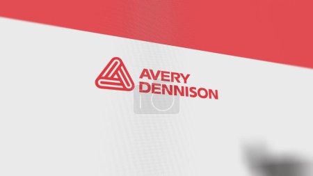 Foto de El logotipo de Avery Dennison en una pared blanca de pantallas. Marca Avery Dennison en un dispositivo. - Imagen libre de derechos
