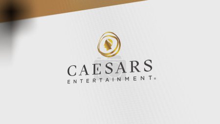 Photo for The logo of Caesars Entertainment on a white wall of screens. Caesars Entertainment brand on a device. - Royalty Free Image