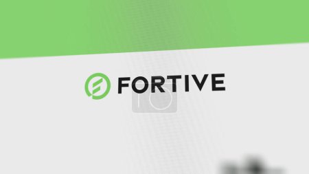Photo for The logo of Fortive on a white wall of screens. Fortive brand on a device. - Royalty Free Image