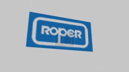 Foto de El logotipo de Roper Technologies en una pared blanca de pantallas. Marca Roper Technologies en un dispositivo. - Imagen libre de derechos
